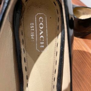 COACH patent leather pumps